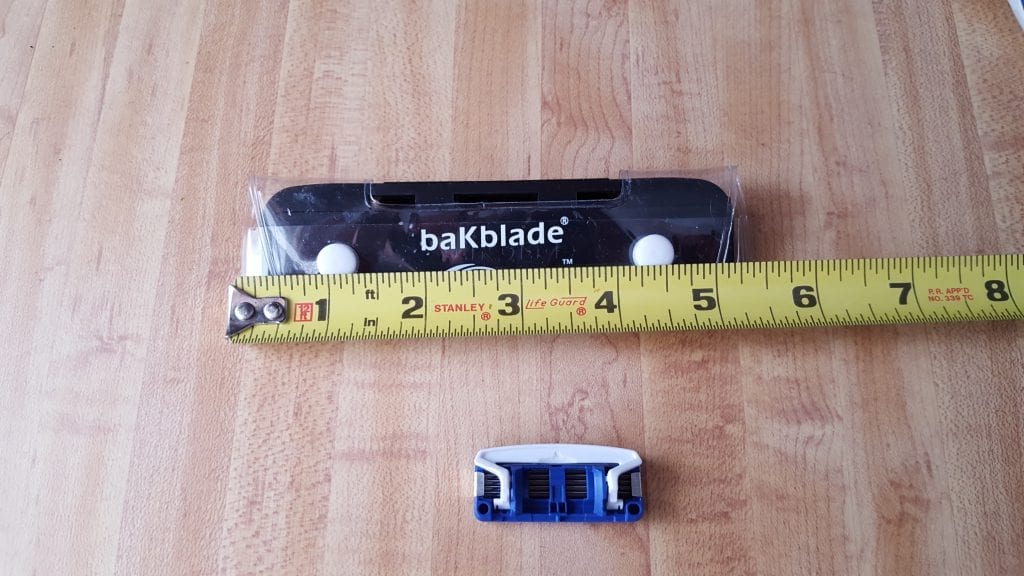 measuring bakblade shaving head with tape