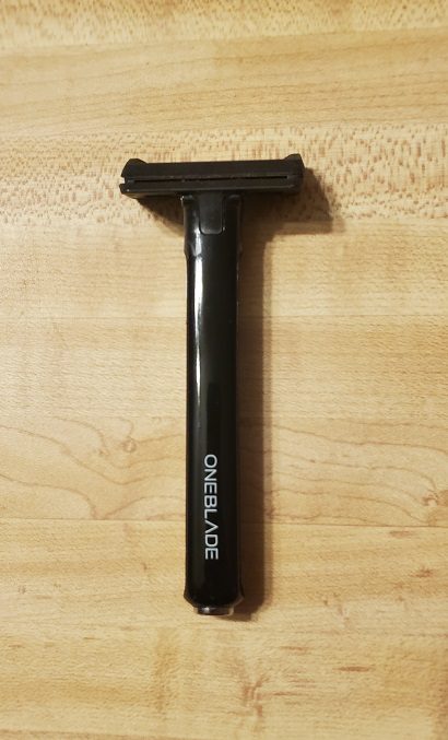 oneblade core razor on wood