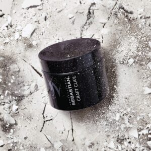 black container of clay