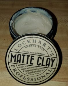 open jar of matte clay