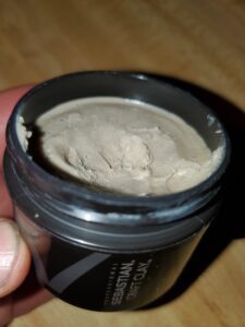 opened jar of craft clay