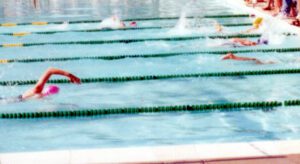 people swimming in a pool