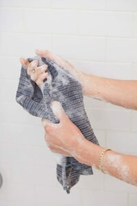 towel in shower with soap