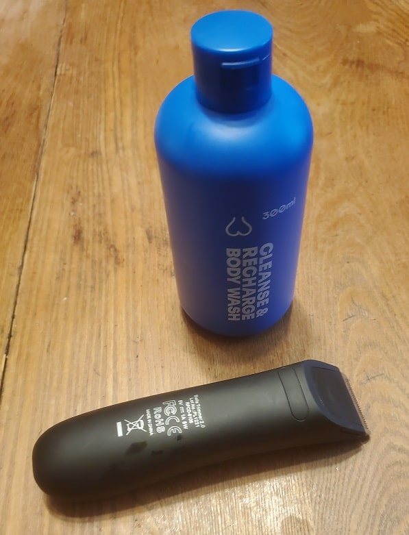 a trimmer and blue bottle