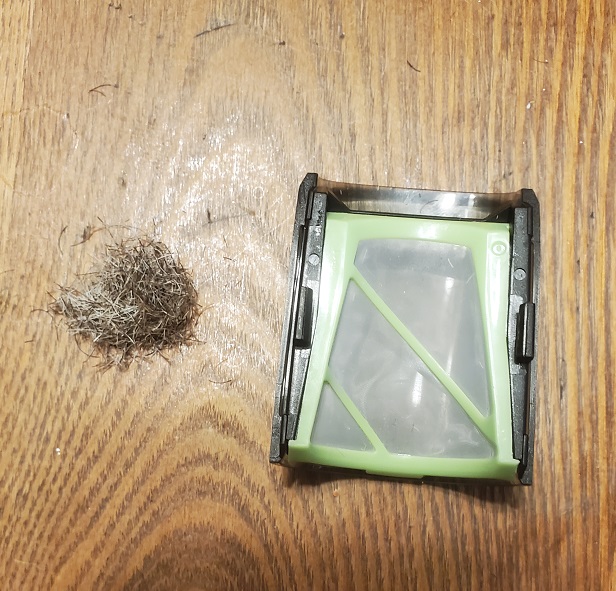 hair clippings with bin
