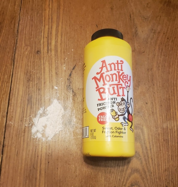yellow bottle of powder on table