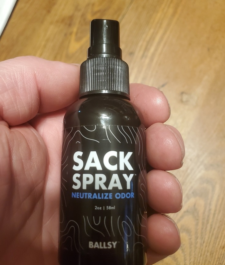 hand holding spray bottle