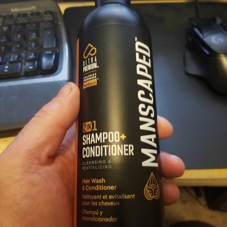 hand holding shampoo